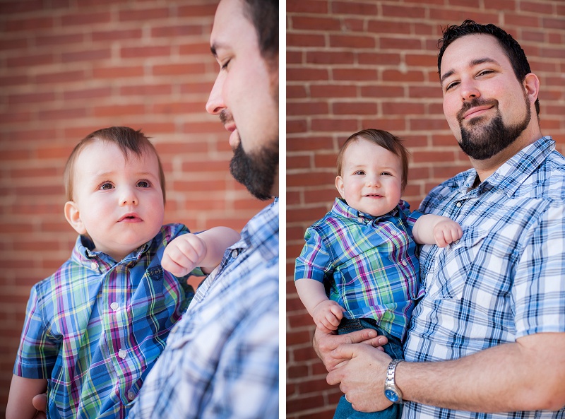 Father holding son wearing plaid