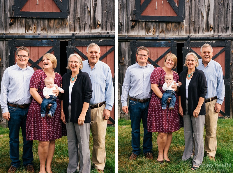 beautiful family in front of red barn door